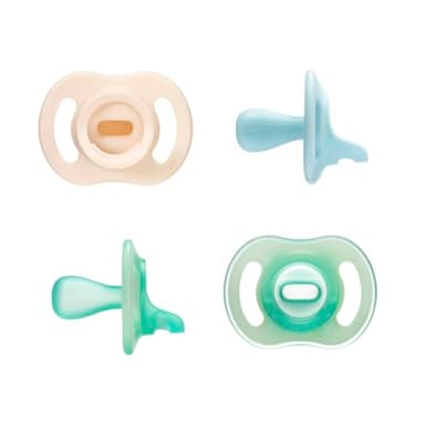 Tommee Tippee Stay Put Pacifier Set, Contains 2 Ultra-Light StayPut Glow in The Dark Pacifiers and 2 Ultra-Light StayPut Pacifiers, 0-6 Months, Colors May Vary, One-Piece Silicone Design, Pack of 4 - Image 1