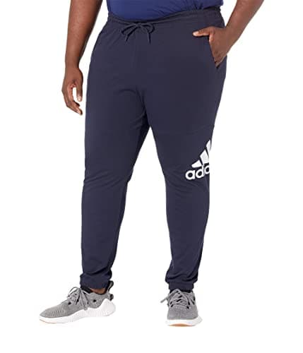 adidas Men's Essentials Single Jersey Tapered Badge of Sport Pants, Ink, Small - Image 1