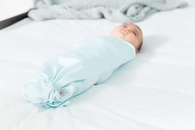 The Ollie Swaddle – Adjustable Baby Swaddle for Newborns | Pediatrician-Approved for Safe Sleep | Easy Closure | Arms-Out | Lightweight, Machine-Washable | Easy Diaper Access - Image 9