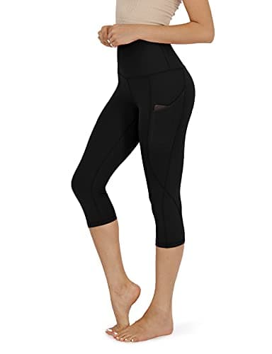 ODODOS Women's High Waisted Yoga Capris with Pockets,Tummy Control Non See Through Workout Sports Running Capri Leggings, Black,Medium - Image 1