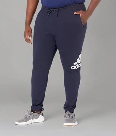 adidas Men's Essentials Single Jersey Tapered Badge of Sport Pants, Ink, Small - Image 3