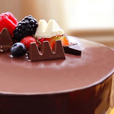 TOBLERONE Tiny Assorted Chocolate Bars Variety Pack (Milk, Dark, & White), 1 Gift Bag (27 Pieces) - Image 11