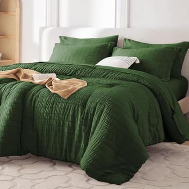 MUXHOMO 7 Pieces Queen Comforter Set, Seersucker Bed in a Bag Queen Size, All Season Luxury Bedding Set with Comforter, Flat Sheet, Fitted Sheet, Pillowcases & Shams, Dark Green - Image 1