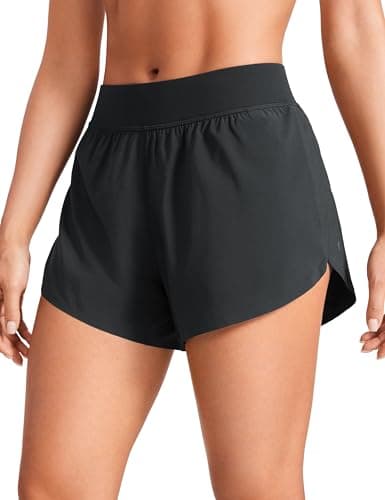 CRZ YOGA Mid Waisted Dolphin Athletic Shorts for Women 4" Lightweight High Split for Gym Workout with Liner Quick Dry Black Medium - Image 1
