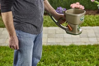 Scotts Whirl Hand-Powered Spreader for Grass Seed, Fertilizer, Salt, Ice Melt, Handheld Spreader Holds up to 1,500 sq. ft. Product - Image 4