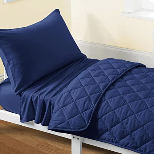 FLXXIE 4 Pieces Toddler Bedding Set, Soft and Breathable Microfiber Crib Sheet Set, Includes Quilted Comforter, Flat Top Sheet, Fitted Sheet, Envelope Pillow Case for Boys and Girls, Navy Blue - Image 1