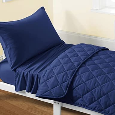 FLXXIE 4 Pieces Toddler Bedding Set, Soft and Breathable Microfiber Crib Sheet Set, Includes Quilted Comforter, Flat Top Sheet, Fitted Sheet, Envelope Pillow Case for Boys and Girls, Navy Blue - Image 1