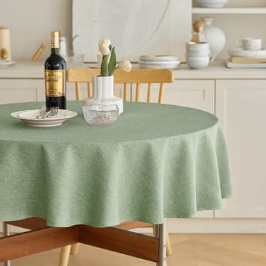 Decorelia Faux Linen Round Tablecloths 60 inch, Waterproof Decorative Washable Texture Rustic Circle Table Cloth Cover for Dining Kitchen Party Farmhouse Outdoor(60 Inch,Round (2-4 Seats),Sage Green) - Image 1