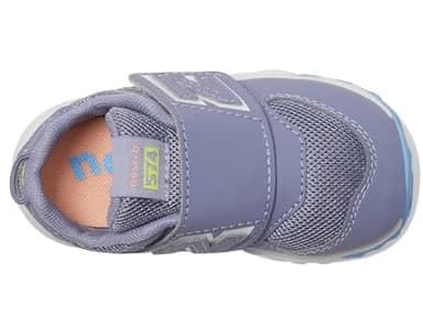 New Balance Kid's 574 V1 Midsole Hook and Loop Sneaker, Astral Purple/Clear Yellow, 3.5 XW Infant - Image 2