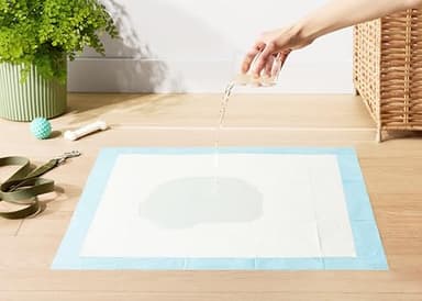 Amazon Basics Dog and Puppy Pee Pads with 5-Layer Leak-Proof Design and Quick-Dry Surface for Potty Training, Standard Absorbency, X-Large, 28 x 34 Inch - Pack of 60, Blue & White - Image 3