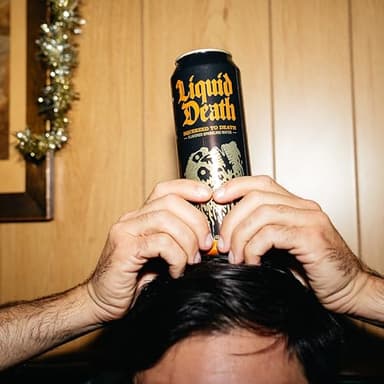 Liquid Death, Squeezed to Death, Orange-Flavored Sparkling Water, 8-Pack (19.2oz Cans), Low Calorie & No Artificial Sweeteners - Image 5