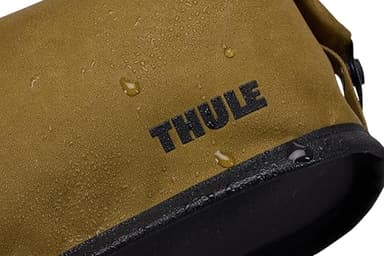 Thule Aion Toiletry Bag - Water-Resistant Bag for toiletries, Makeup and Shaving Essentials - Removable Liquids Bag Included - Easy to Clean - Snap Loop to Easily Hang - Waxed, PFC-Free Fabric - Image 13
