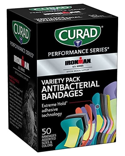 CURAD Performance Series IRONMAN Antibacterial Bandages, Extreme Hold Adhesive Technology, Finger & Knuckle Bandages, Flexible Fabric, Variety Pack with Assorted Sizes & Colors, 50 Count - Image 1