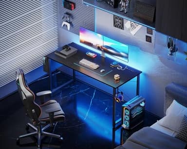 KKL Small Desk with Power Outlets and USB Port Computer Desk for Home Office Gaming Simple Modern Style Writing Desks with Storage Bag Headphone Hook, 48 inch, Black - Image 2