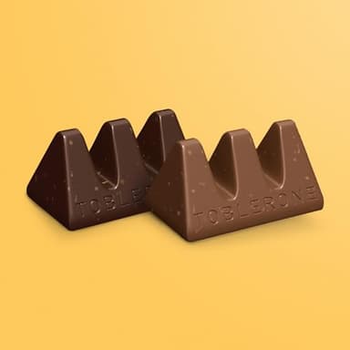 TOBLERONE Tiny Assorted Chocolate Bars Variety Pack (Milk & Dark), 1 Gift Box (25 Pieces) - Image 6