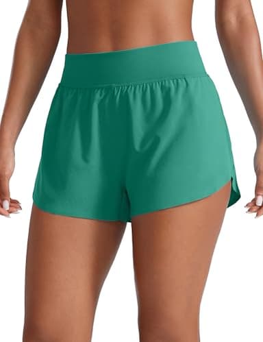 CRZ YOGA High Waisted Dolphin Athletic Running Shorts for Women 3" High Split Comfy Mesh Liner for Gym Workout Track Cascadia Green XX-Small - Image 1