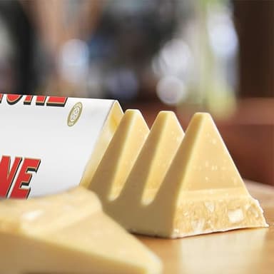 TOBLERONE Assorted Chocolate Bars Variety Pack (Milk, White, & Salted Caramelized Almonds), Bulk Chocolate, 1 Gift Box (9 Bars) - Image 8