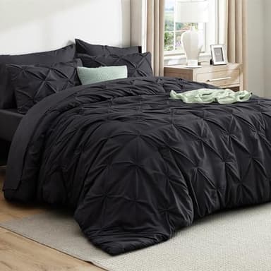 Bedsure Queen Comforter Set Black - Bed in a Bag Queen Size 7 Pieces, GentleSoft™ Pintuck Bed Set Gift for Family, Pinch Pleat Black Comforter with Sheets, Pillowcases & Shams - Image 1