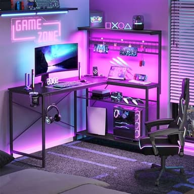 Bestier Gaming Desk 51" L-Shaped, with Power Outlets & LED Lights- 4 Tier Shelves, Reversible Gamer Table with Hooks & Cup Holder for Home Office Carbon Fiber Black - Image 1